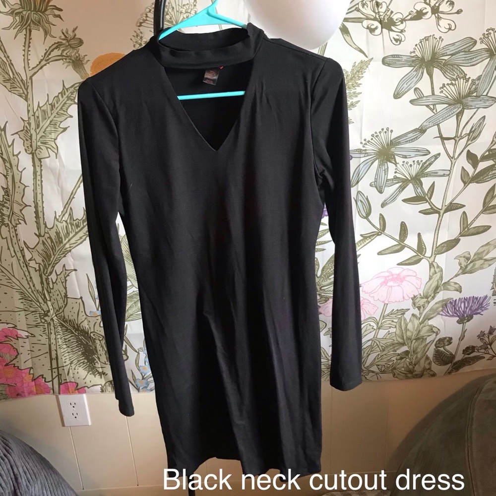 Dress with neck cutout detail